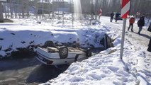 İteklenen Otomobil Buz Tutmuş Kanala Düştü