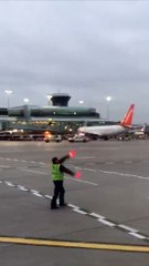 Airport Ground Crew Put on a Show for Passengers