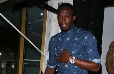 Usain Bolt surprises gym goers in London