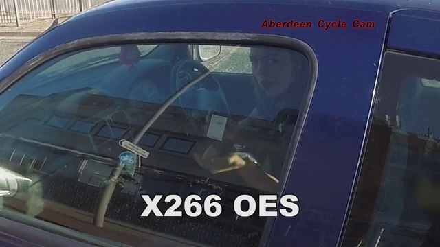 X266OES - Phone in one hand, eating crisps with the other, soda can between the legs - Lang Stracht, Aberdeen