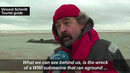 WWI submarine emerges from the sand in northern France