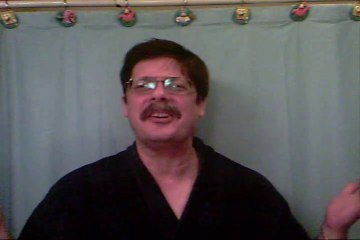 1036. WHAT ANIMAL HAS A 21 INCH TONGUE , AND USES IT TO CLEAN THERE EARS ?