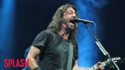 Dave Grohl Takes A Tumble After Downing Bud Light Beer