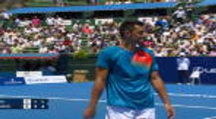 Tomic with outrageous trick serve to beat Kyrgios