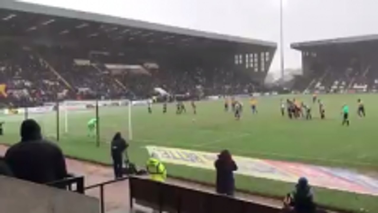Mansfield Town fans celebrating their 99th minu...