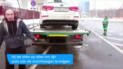 Heetgebakerde Rus laat auto niet wegslepen