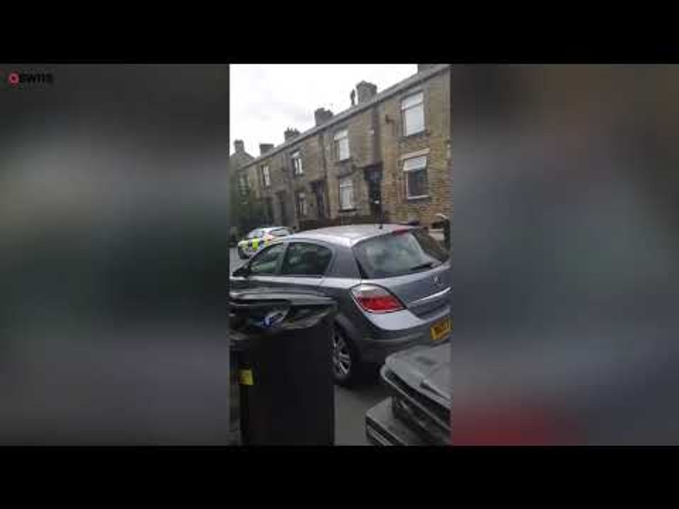 Moment a pervert sparked a five-hour rooftop standoff | SWNS TV | SWNS TV