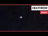 Commuter captures footage of 'drone' over Heathrow Airport | SWNS TV