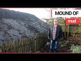 Enormous 25ft high pile of soil appears behind enraged resident's houses | SWNS TV