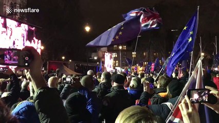 Pro-EU protesters react to May's Brexit Commons defeat