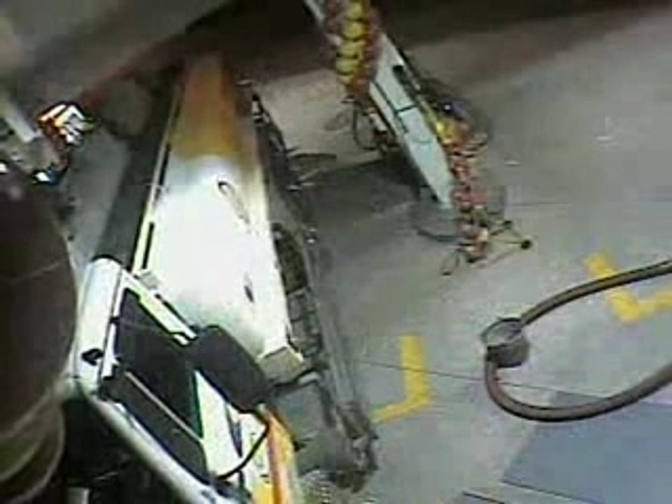 Telephone portable dans une station service