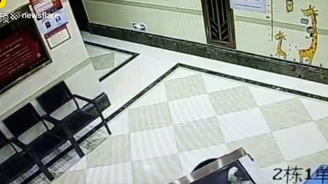 Glass door collapses onto woman when she tries to open it