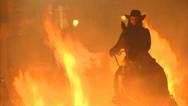 Horses jump bonfires at Spanish festival's 'purification ceremony'