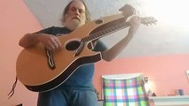 AND I LOVE HER ( BEATLES) HARP GUITAR - CHRIS YOUNG