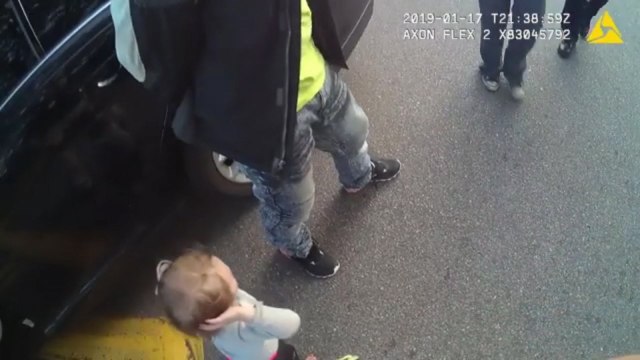 2-Year-Old Toddler Approaches Police With Hands Up As Parents Get Arrested