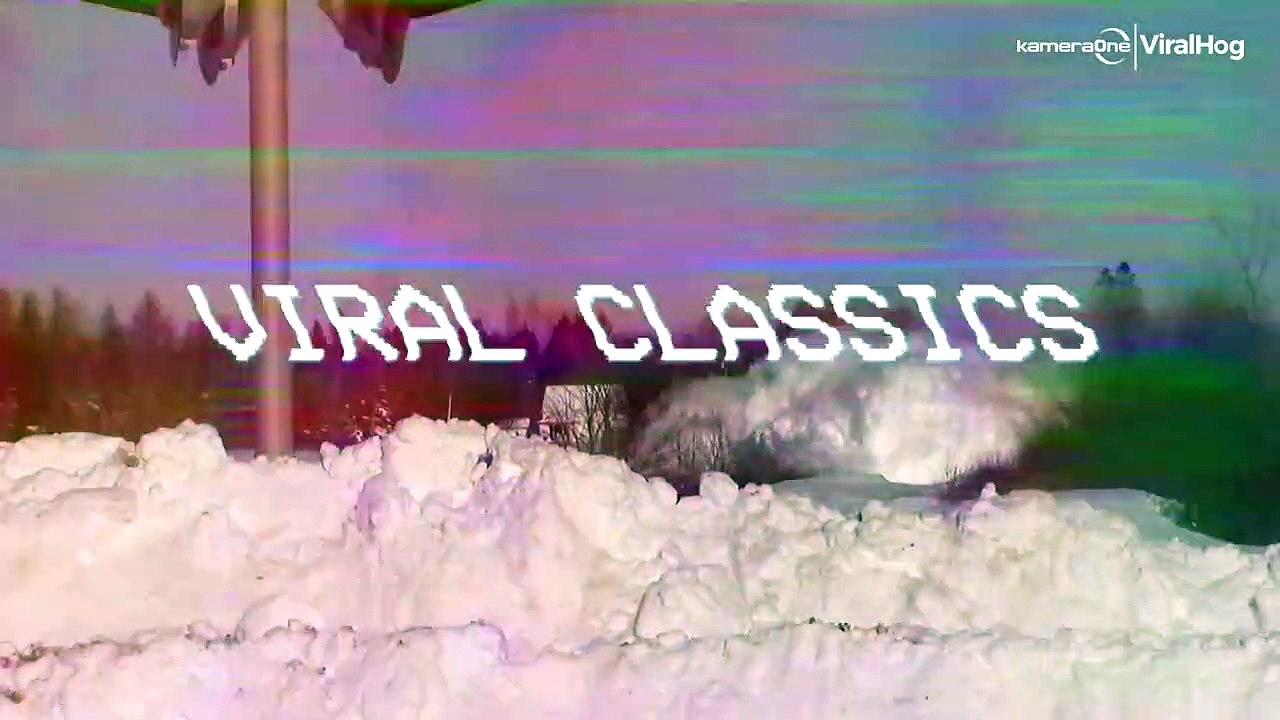 Train Plows Through Wall Of Snow