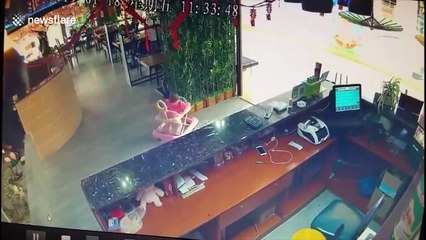 Heroic soldier runs to rescue infant falling down an escalator