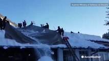 Crews find innovative way to clear deep snow from roof