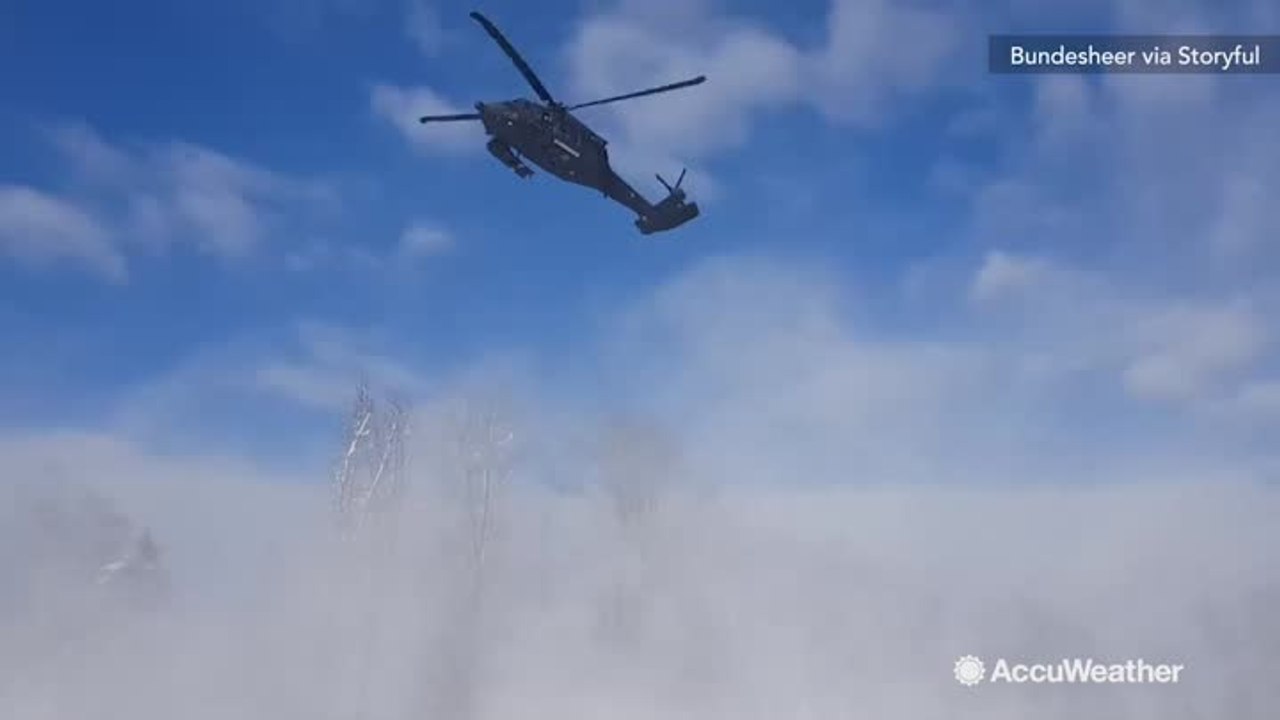 Using a helicopter to clear away snow