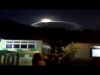 LARGE DISK LIKE UFO APPEARS OVER INDONESIA!!!