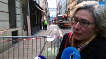 10 jours après l'explosion de la rue de Trévise, à Paris, Claire, une habitante du n'6, le plus touché, vient observer le début des travaux de consolidation