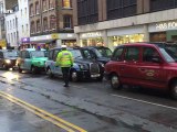 London cabbies block Tottenham Court Road over vehicle ban