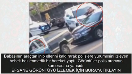 Efsane bir görüntü! ABD'de babası gözaltına alınan bebeğin yaptığına bakın