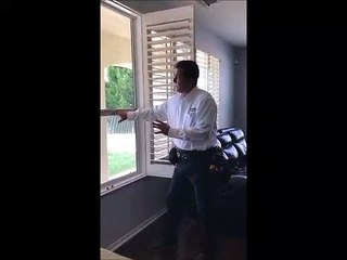 Home Inspector Shows Window Inspection