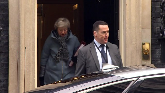 Theresa May departs Downing Street for PMQs