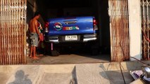 Driver finds 5ft long monitor lizard hiding under his car