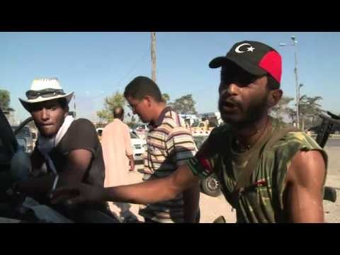 Libya rebels storm into Tripoli