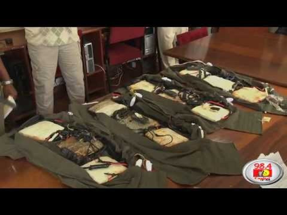 8 sought over terror plot after weapons seizure