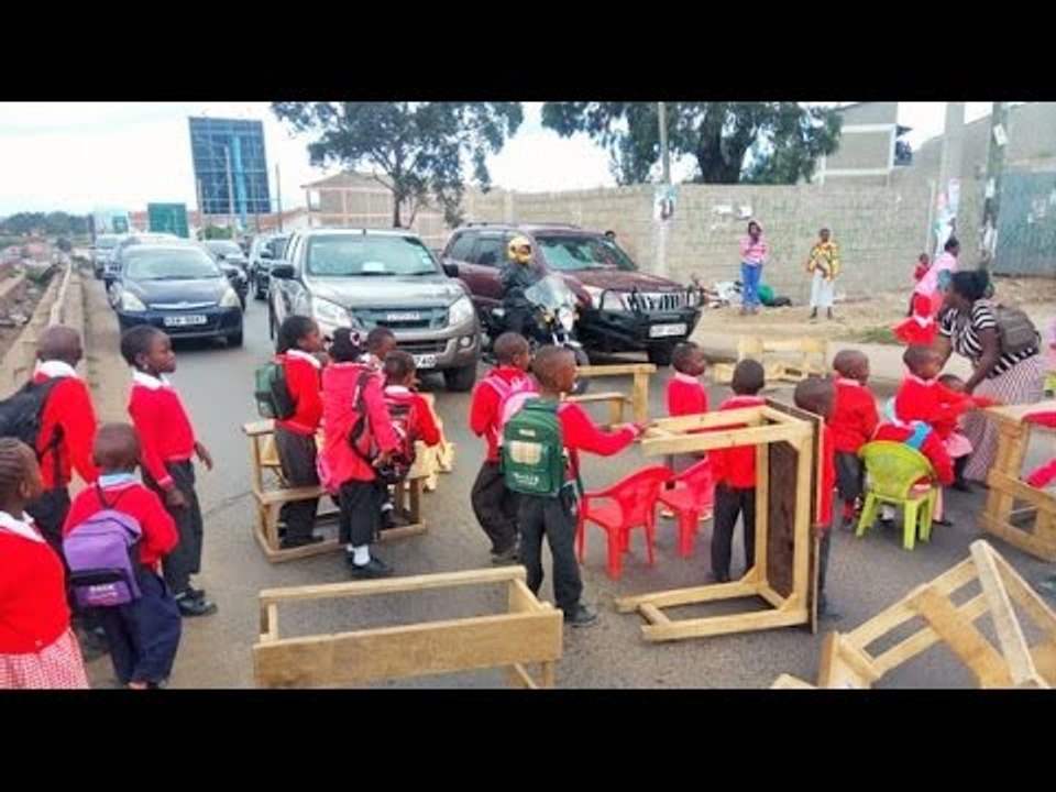Drama as pupils, teachers block Mbagathi Road over school demolition