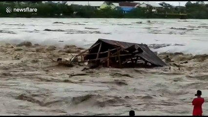 House washed away in Indonesia flooding