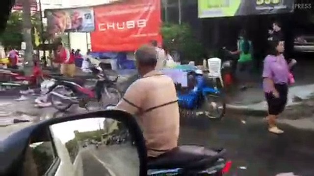 Over-Turned Truck Spills 80,000 Cans Of Beer Sending Locals Into A Looting Frenzy