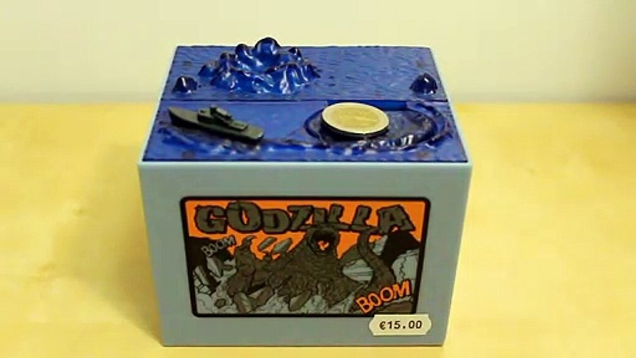 Godzilla tirelire attrape pièce