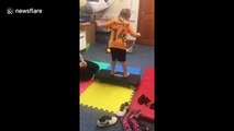 Inspirational moment boy with cerebral palsy walks without splints