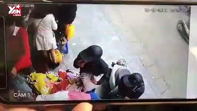 Góc cảnh giác mùa Tết: Màn móc túi tinh vi căng mắt xem nhiều lần vẫn không biết cô gái bị móc điện thoại