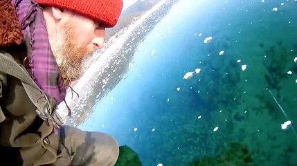 Man Films Mesmerizing Walk Across Ice On World’s Deepest Lake