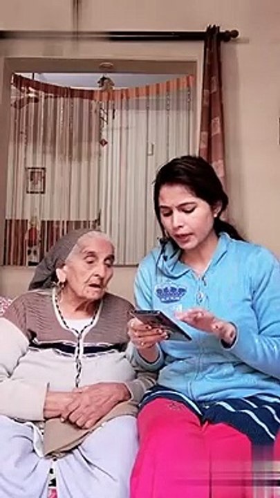 grand mother and daughter on mobile handling ,funny video