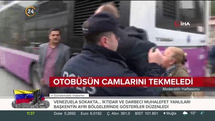 Otobüsün camlarını tekmeledi
