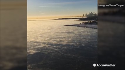 Lake smoke creates a breathtaking view at sunrise
