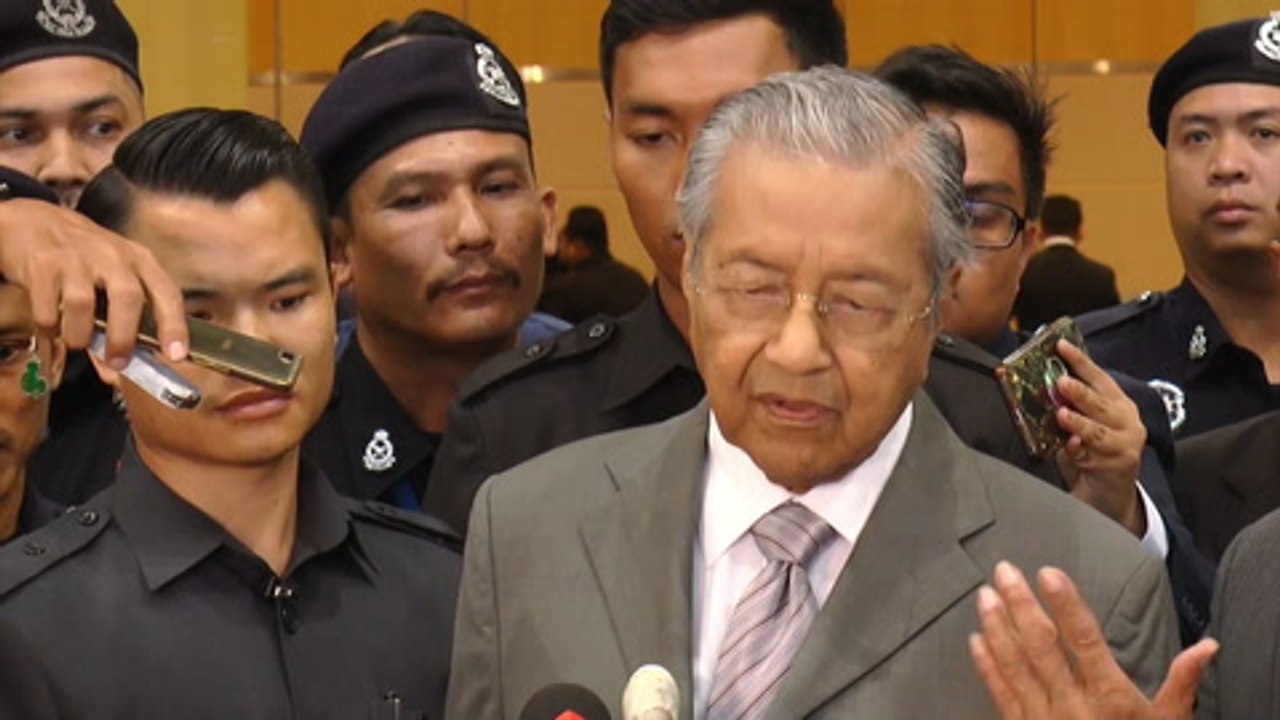 Dr M: Be patient, wait for Guan Eng's announcem...