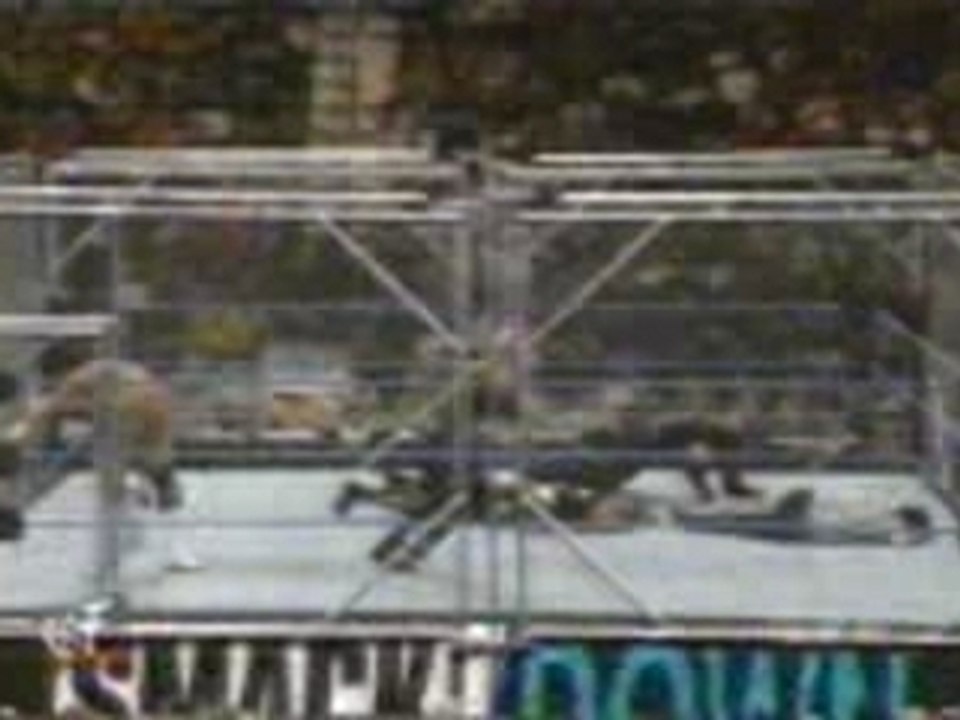 WWE - Billy Gunn Backdrops Jeff Hardy Over Cage