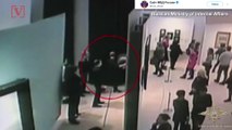 Watch Alleged Art Thief Brazenly Stroll Off With Painting in Gallery Full of People