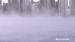 Steam rises off Lake Michigan as temperatures plummet below zero