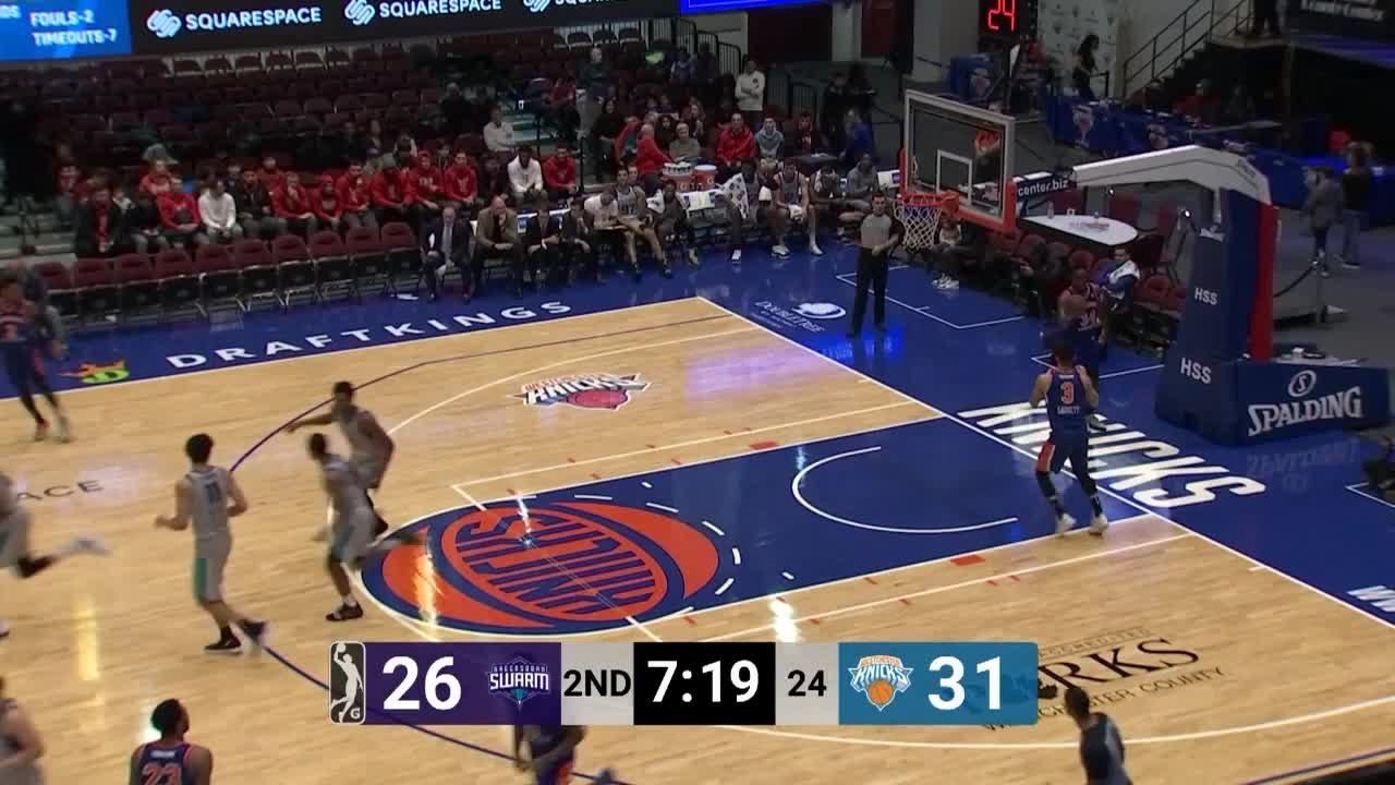 Malik Pope slams home the alley-oop