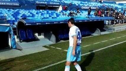 Dorado y Linares en el césped de La Romareda