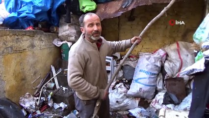 Çöp evden mermilerle birlikte yüzlerce kağıt ve madeni para çıktı