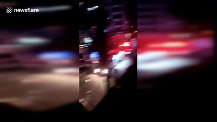 Emergency workers search hotel explosion aftermath in northern China